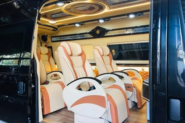 Luxury 9-seat VIP limousine van interior with leather seats by Ninh Binh Shuttle
