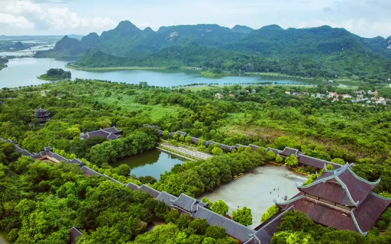 Bai Dinh Pagoda complex aerial view with lush green mountains in Ninh Binh