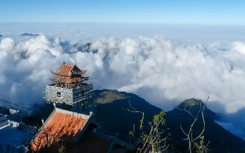 Sapa travel cost 2026 with mountain scenery and travelers