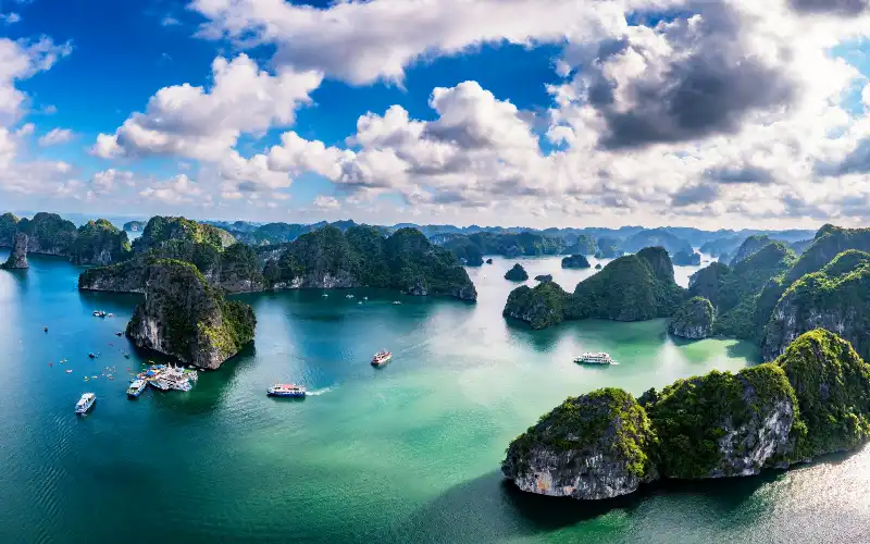 lan-ha-bay-cat-ba-travel-guide Limestone islands and emerald water in Lan Ha Bay near Cat Ba